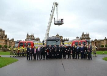 Representatives from three fire services with new fire engines and ALP.