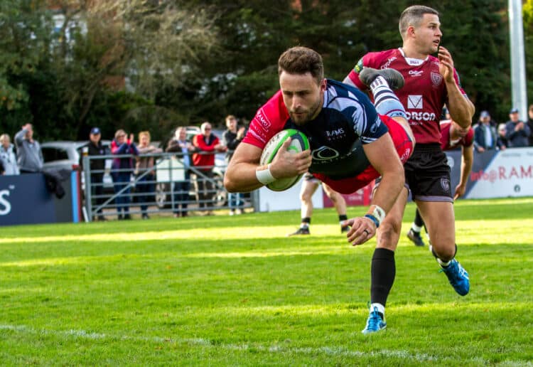 Jack Rossiter dives over against Sale Pictures: Paul Clark