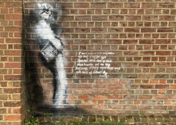 Banksy-style artwork appears on Reading Gaol.