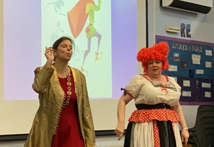 Cast members from The Pied Piper visit St Teresa's Schol in Wokingham