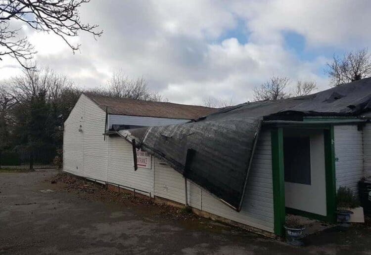 The wind-damaged roof of Shinfield Players Theatre