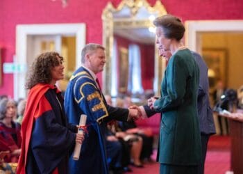 Professor Robert Van de Noort, Vice-Chancellor, and Professor Joy Singarayer, joint head of the Department of Meteorology receive the medal. Picture: courtesy of University of Reading