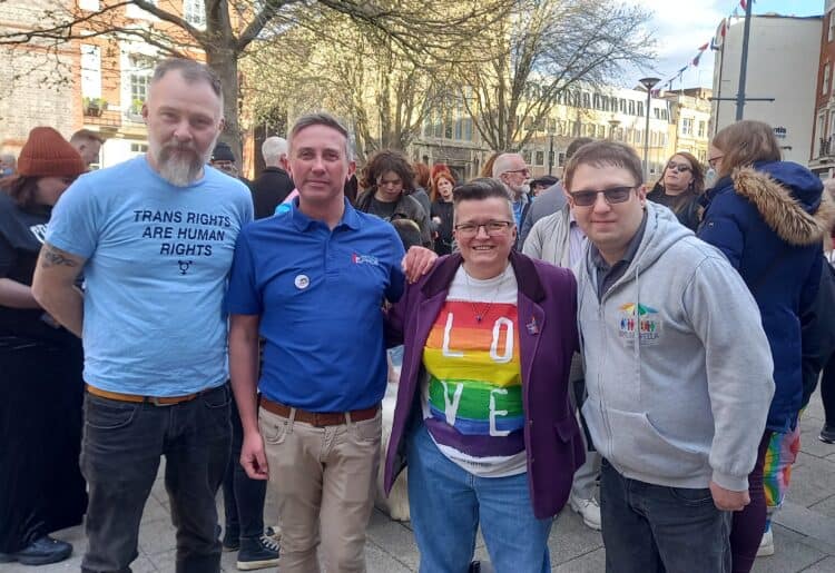 Attendees heard speeches by Reading Pride founding member Jamie Wake, left, chief engagement officer Tom Price, centre left, CEO of Support U Lorna McCardle, centre right, and Reading Pride trustee Mikey Russell, right. Picture: Jake Clothier