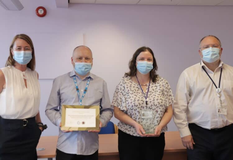The LILAC award was given to the Royal Berkshire Foundation Trust Library and Services team, left, and chief people officer Don Fairley, right. Picture courtesy of Royal Berkshite BHS Foundation Trust
