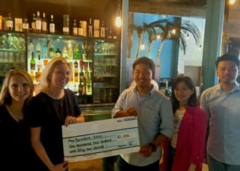 Berkshire Vision CEO, Laura Mitchell, and marketing officer, Clare Matthews, with Coconut Bar director Kaman Lam, and staff, Jacky and Binay. Picture: Jake Clothier