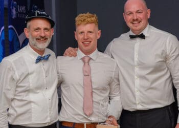 Ollie Cole (centre) was the Players' Player of the Year, pictured with first-team manager Matt Maxwell and DoR, Seb Reynolds