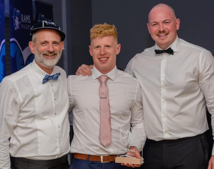 Ollie Cole (centre) was the Players' Player of the Year, pictured with first-team manager Matt Maxwell and DoR, Seb Reynolds