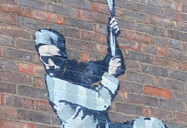 Banksy's artwork on the side of the Reading gaol wall Picture: Phil Creighton