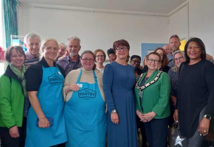 Faith Christian Group's assistant director, Amanda Bayley, with Cllr Debs Edwards, and members and trustees of the Norcot Pantry. Picture: Jake Clothier