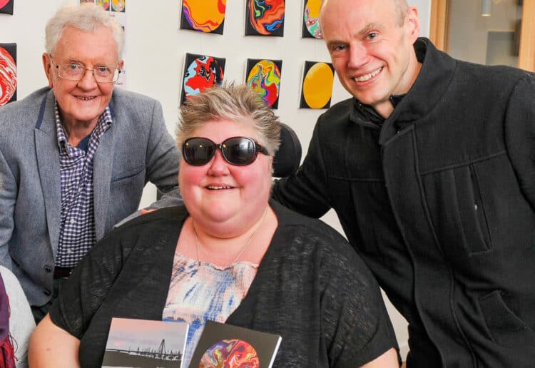 Emma Major, centre led artists in a series of sessions, including many who had not painted before.