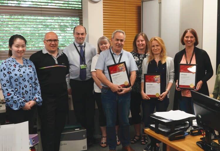 The Reading Buses finance team celebrate the Star of the Month award