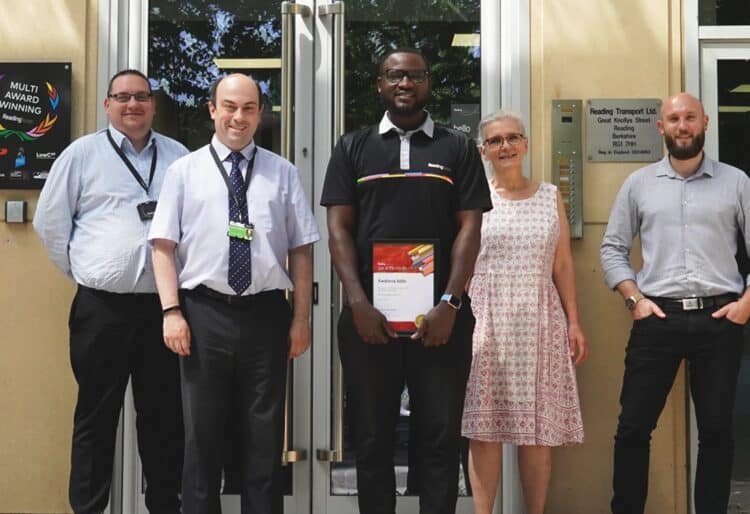 Kwabena Addo with his Star of the Month award from Reading Buses