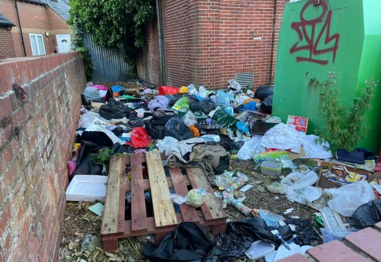 Large amounts of rubbish dumped at the bottle bank in Erleigh Road, East Reading. Credit: James Aldridge, Local Democracy Reporting Service