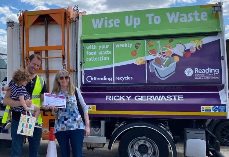 Resident Adrian Jack receives a certificate from Lead Councillor for Environmental Services and Community Safety Karen Rowland alongside the truck he named Ricky Gerwaste Picture: Reading Borough Council