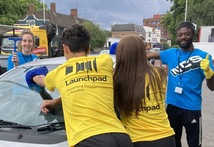 Cleaning cars in the church forecourt. Some of the team with leaders Jenna and Isaac. Picture: Emma Merchant