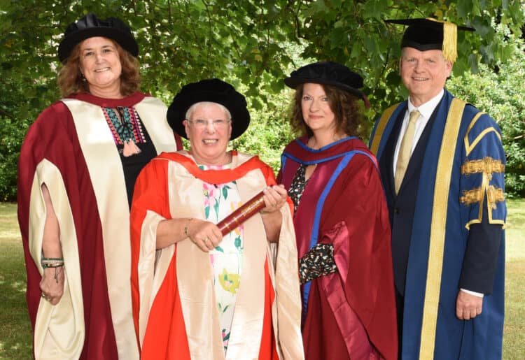 HONOURED: (From left) Prof Carol Fuller, Head of Institute of Education; Ms Trisha Bennett; Dr Sally Lloyd-Evans, Public engagement research fellow; Dr Robert Van de Noort, Vice-Chancellor were in attendance to see Ms Bennett receive her honorary degree. Picture courtesy of the University of Reading