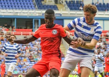 Hometown favourite Tom Holmes was left disappointed by Reading Academy's downgrade to Category Two status. The centre-half joined the club at the age of eight. Picture: Steve Smyth