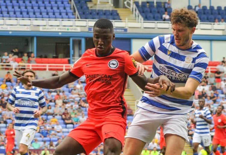 Hometown favourite Tom Holmes was left disappointed by Reading Academy's downgrade to Category Two status. The centre-half joined the club at the age of eight. Picture: Steve Smyth
