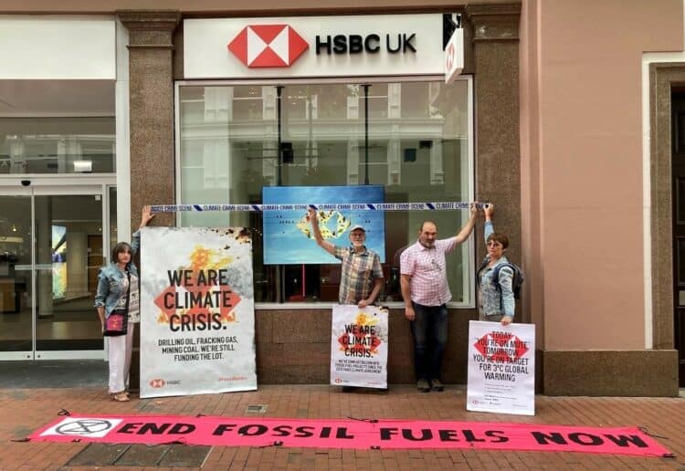 Extinction Rebellion campaigners at the reopening of HSBC in Broad Street, Reading. Credit: Extinction Rebellion Reading