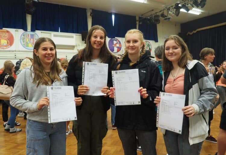 Freya, Charli, Charlotte and Lyra collect their GCSEs at The Willink School