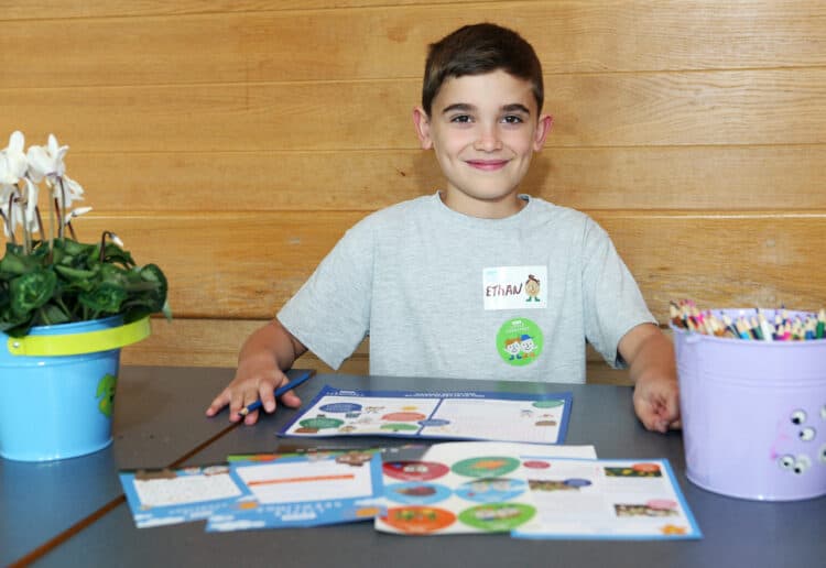 Ethan Firth, a Little Seedlings Ambassador, is taking part in a Dobbies workshop for children about how to grow fruit at home Picture: Dobbies