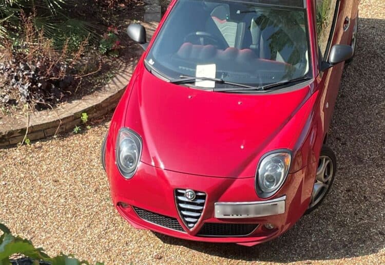 The red Alfa Romeo that was parked on the drive in St Peters Hill, Caversham without consent. Picture: Jon Evans/Local democracy reporting service