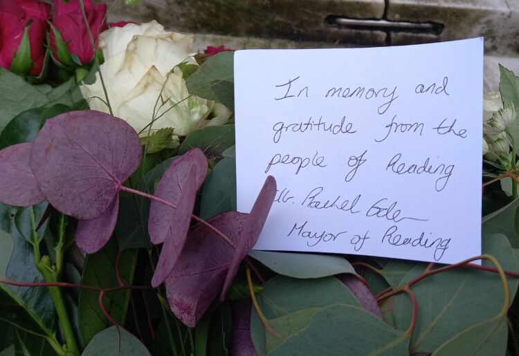 Tributes have been left in memory of the Queen at the foot of a statue of Queen Victoria in Reading Picture: Jake Clothier