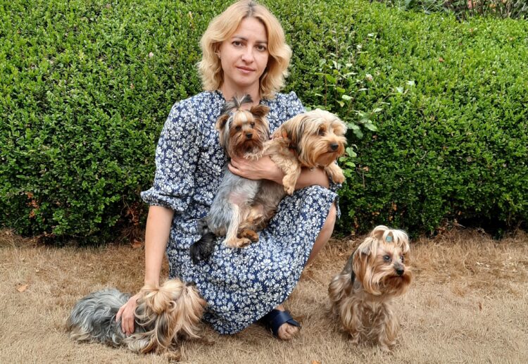 Anfisa Vlasova, 41, from eastern Ukraine, with her Yorkshire terriers Betty, Nora, Daisy and Teddy. Credit: Anfisa Vlasova
