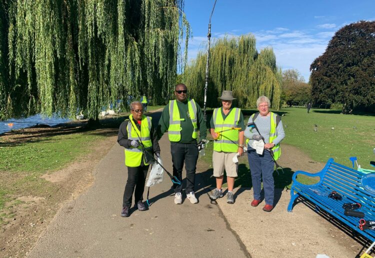 Rotary Club members tidying up Caversham Meadows