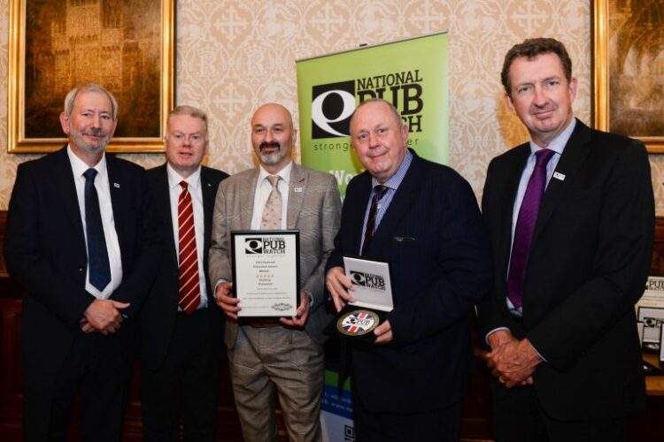 From left, Steve Baker OBE, chair of National Pub Watch; Lord Kennedy; Stuart McNaught, chair of Reading Pubwatch; Bill Donne, secretary to Reading Pubwatch; and Nigel Connor, JD Wetherspoon