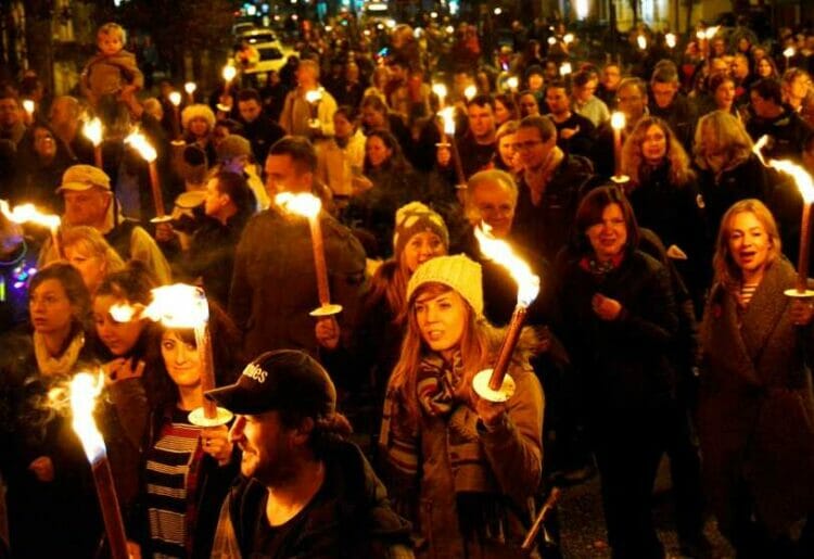 The torchlit procession will leave from Market Place. Residents carry flaming torches in the 2015 event. Picture: Phil Creighton