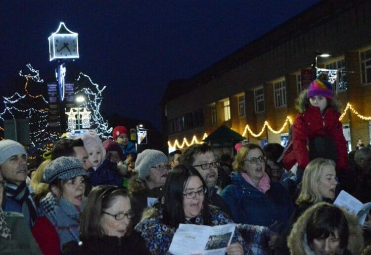 Carol singing at the Woodley Christmas light switch-on in 2018