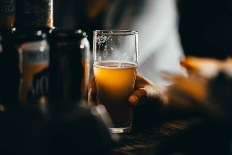 A half-drunk pint of slightly cloudy beer. Picture: Josh Olalde via Unsplash