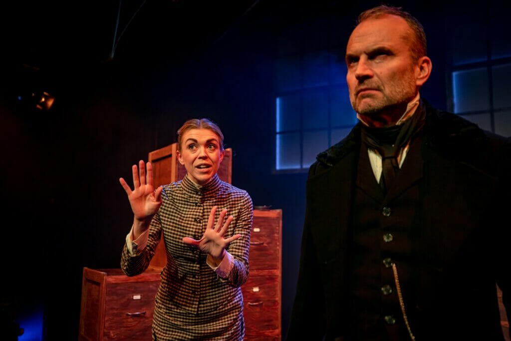 Charlotte Warner as Bobbie Cratchet and Jeremy Drakes as Scrooge. Picture: Harry Elletson, courtesy of Reading Repertory Theatre