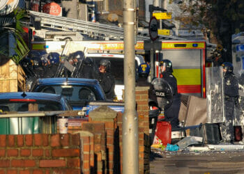 Thames Valley Police, in riot gear, were pictured attending the incident Picture: Steve Smyth