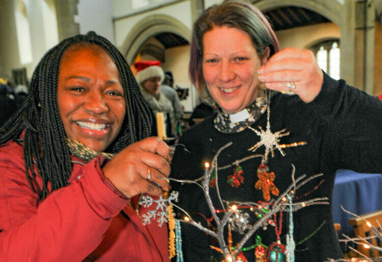 The Christmas Tree Festival and Wassail at St. Mark's Church
in Reading on Saturday.

Wendy Griffith looking at jewelry made by Jo Williams.