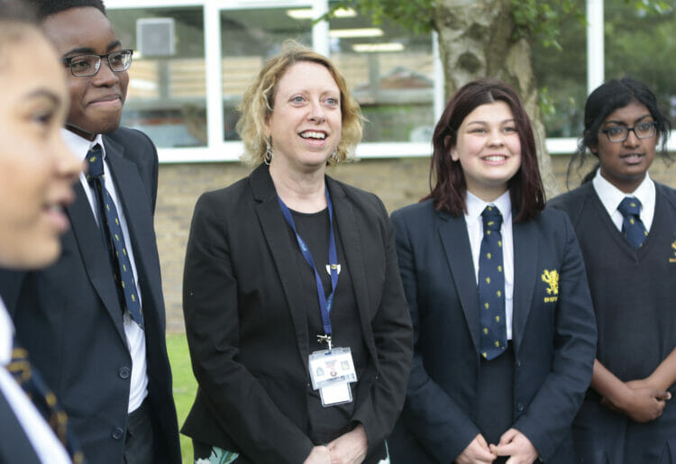 Mary Davies (centre) has been awarded an MBE in the King's New Year's Honours list Picture: Maiden Erlegh Trust