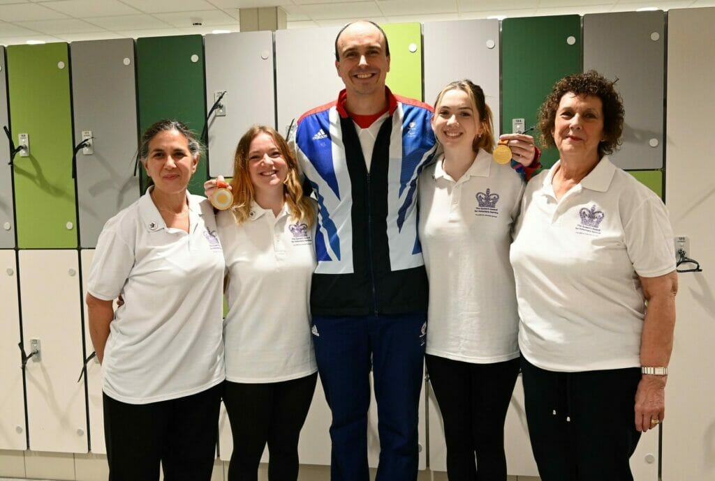 Graham Edmunds PLY with team members at the Electric Eels swimming club. Picture: Chris Forsey, courtesy of Reading Borough Council
