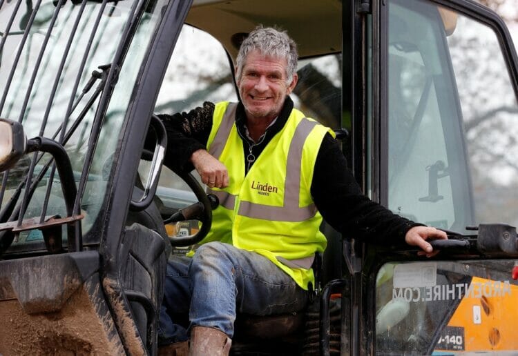 Telescopic forklift driver Frank Bates in his beloved forklift at Vistry Southern?s Catherington Park development
