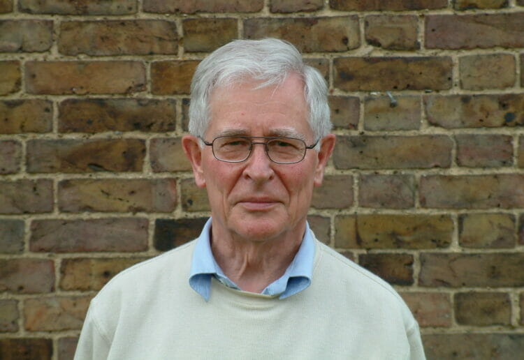 Prof Ian Mills received an OBE for his work in redefining international standard units of measurement. Picture: The University of Reading