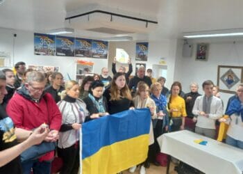 Reading's Ukrainian community marking the minute's silence at Reading Ukrainian Community Centre. Picture: Jake Clothier