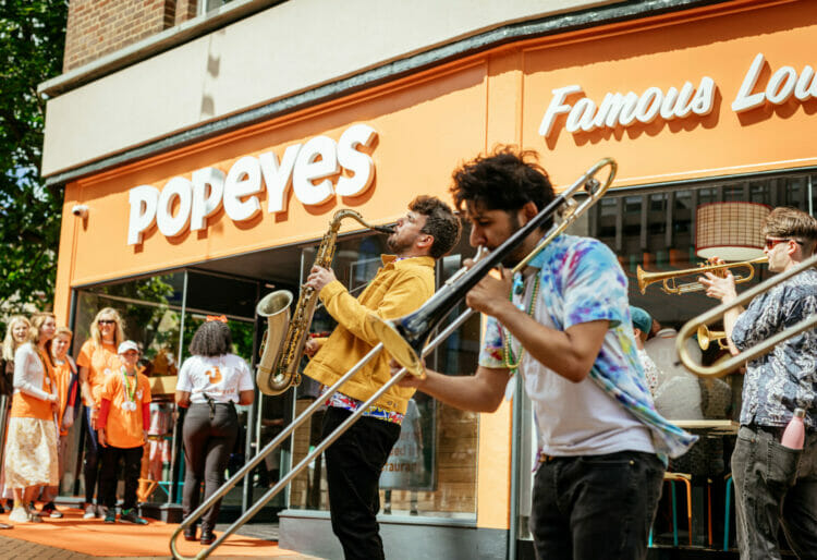 American Fried Chicken restaurant Popeyes is set to open its newest outlet on Broad Street, with a tantalising offer of free chicken snadwidhes for a year and music from the Brass Funkeys. Picture: Courtesy of Rush Images and Popeyes