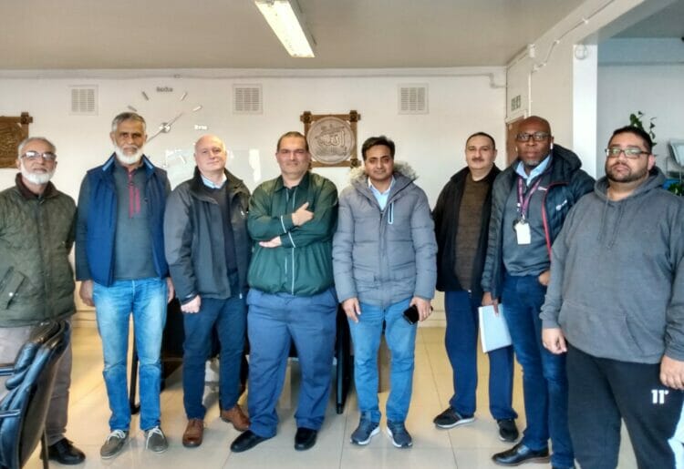 Members of the Reading Private Hire Association and council officers. L to R: Pervaz Akhtar, Manzoor Hussain, licensing officer Clyde Mason, chairman Kamran Saddiq, Sikandar Hayat, Aqeel Kayani, licensing officer Anthony Chawama and Salman Kayani. Picture: Local democracy reporting service
