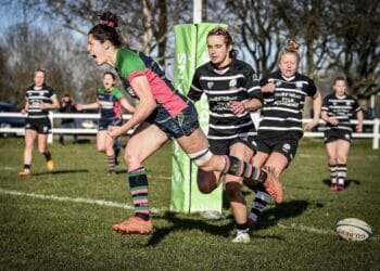 Annette Bevan celebrates her try Pictures: @rugbygrandad