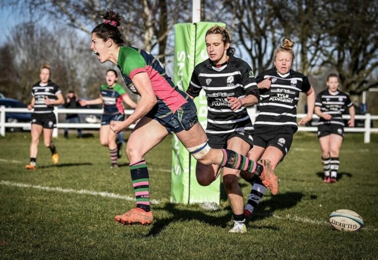 Annette Bevan celebrates her try Pictures: @rugbygrandad