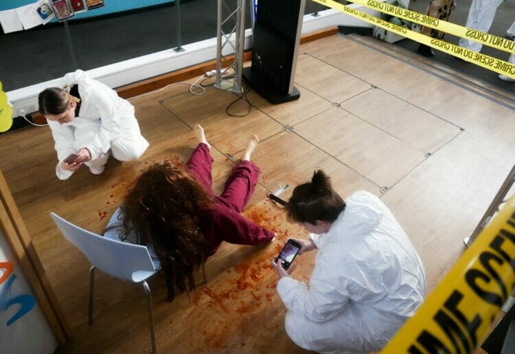 Students Jae and Natalia investigate the fake crime scene at the Kings Road campus. Picture: Courtesy of Activate Learning and Reading College.