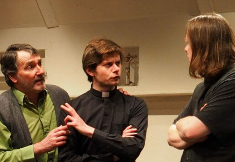 From Left, Paul Gittus as Valene, Adam Wells as Father Welsh, and Damien Passmore as Coleman. Picture: Courtesy of Progress Theatre