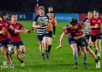 Full back Dan Bennett flicks a pass out of the back of the hand