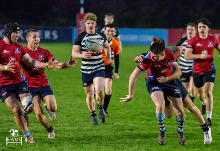 Full back Dan Bennett flicks a pass out of the back of the hand