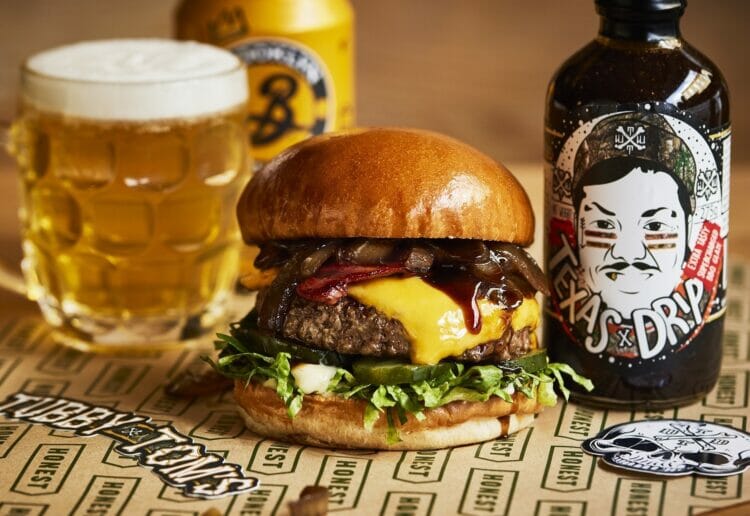 Honest Burgers launches Texas BBQ Burger special for the month of May in collaboration with Gloucestershire-based sauce brand Tubby Tom's.